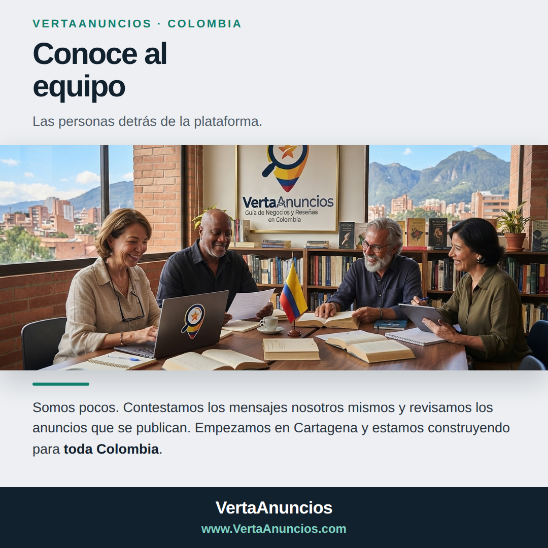 Equipo de VertaAnuncios trabajando alrededor de una mesa con una bandera de Colombia y el logo de VertaAnuncios al fondo.